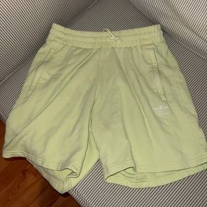 Pale neon Adidas shorts